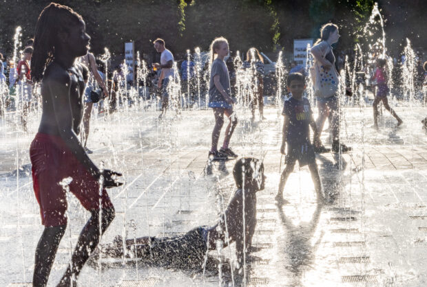 Children playing in Granary Square fountains, King's Cross