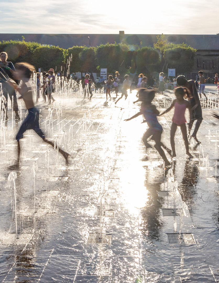 Children playing in Granary Square fountains, King's Cross