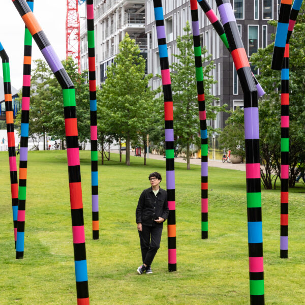 Eva Rothschild with her sculpture 'My World and Your World' in Lewis Cubitt Park at King's Cross