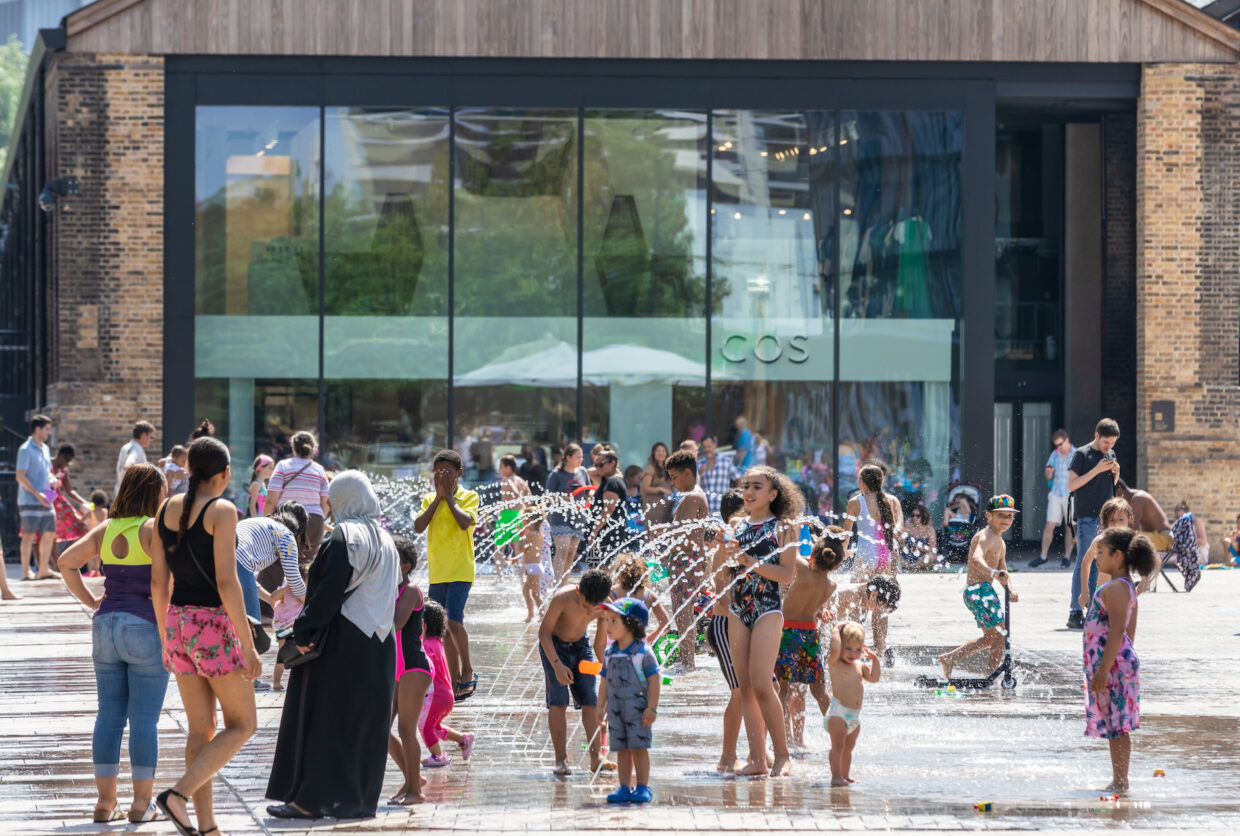 Children in the fountains of Lewis Cubitt Square, King's Cross
