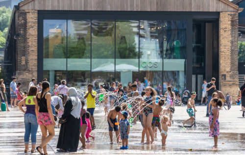 Children in the fountains of Lewis Cubitt Square, King's Cross