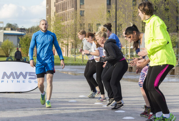 Martin Whitelock leads a Tuesday evening Boot Camp, a rigorous workout for keeping fit at Cubitt Square, King's Cross