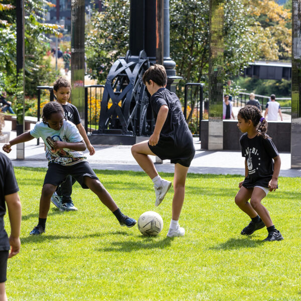 Kids playing in Gasholder Park, King's Cross