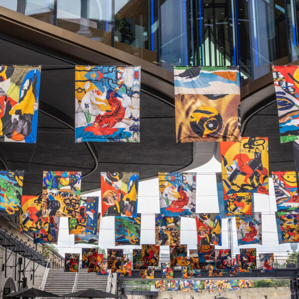 All Our Stories Flag Installation by Bethany Williams at Coal Drops Yard. King's Cross