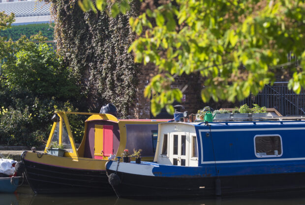 Colourful narrow boats moored on the Regent's canal at King's Cross